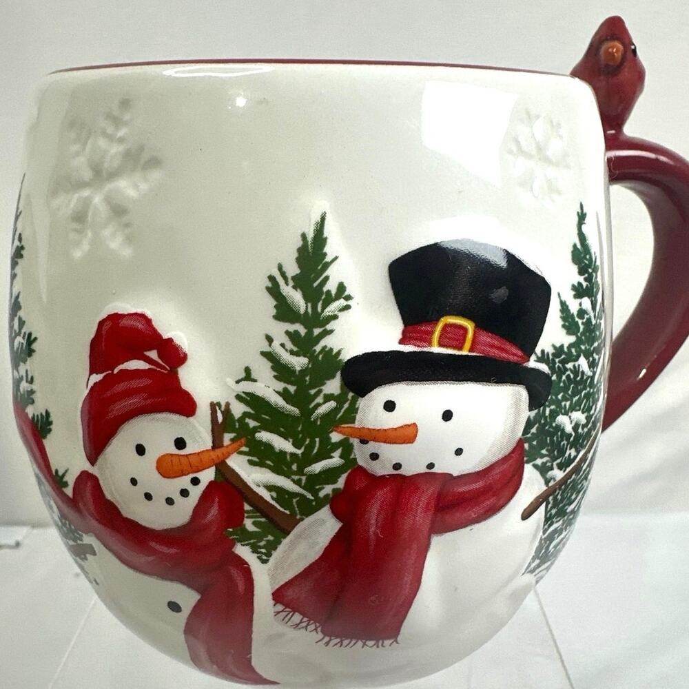 St. Nicholas Square Yuletide Snowman Mug is a hand-painted earthenware mug
